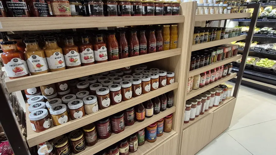 Full gondola of Italian sauces, condiments and passata anchored by our European supplier range.