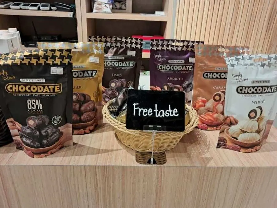 Full Chocodate flavour range on a sampling counter driving trial at point of purchase.